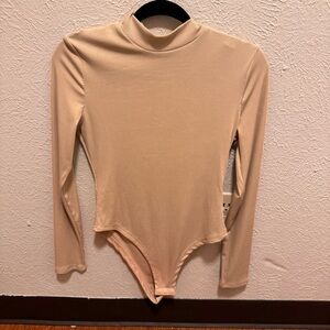 Brown turtleneck bodysuit